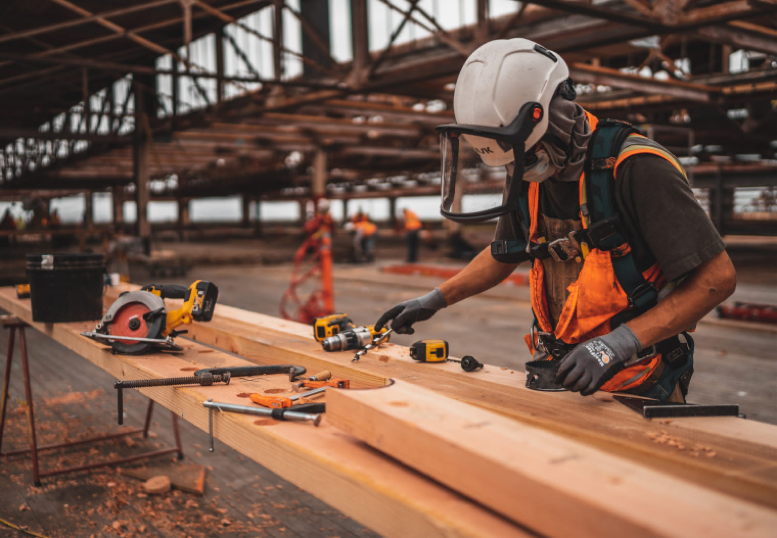 Man measuring lumber