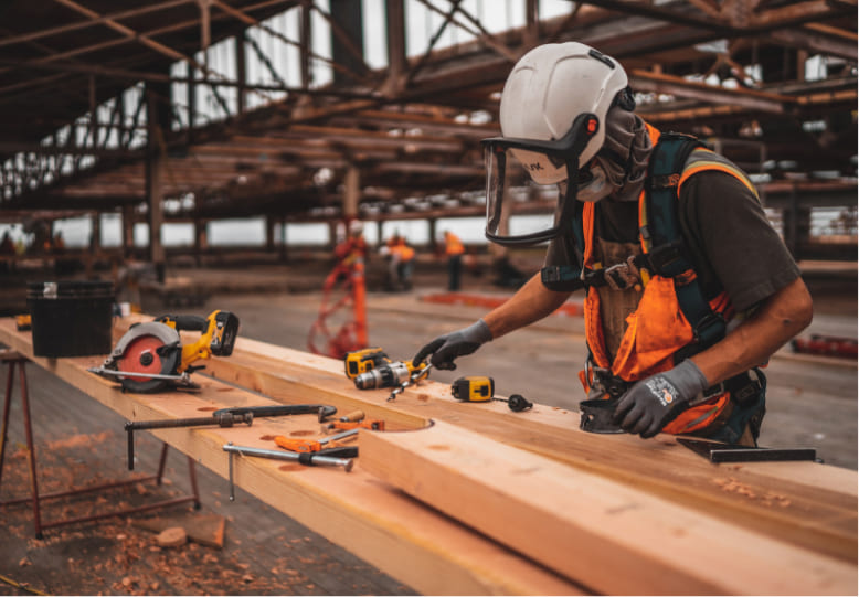 Man measuring lumber